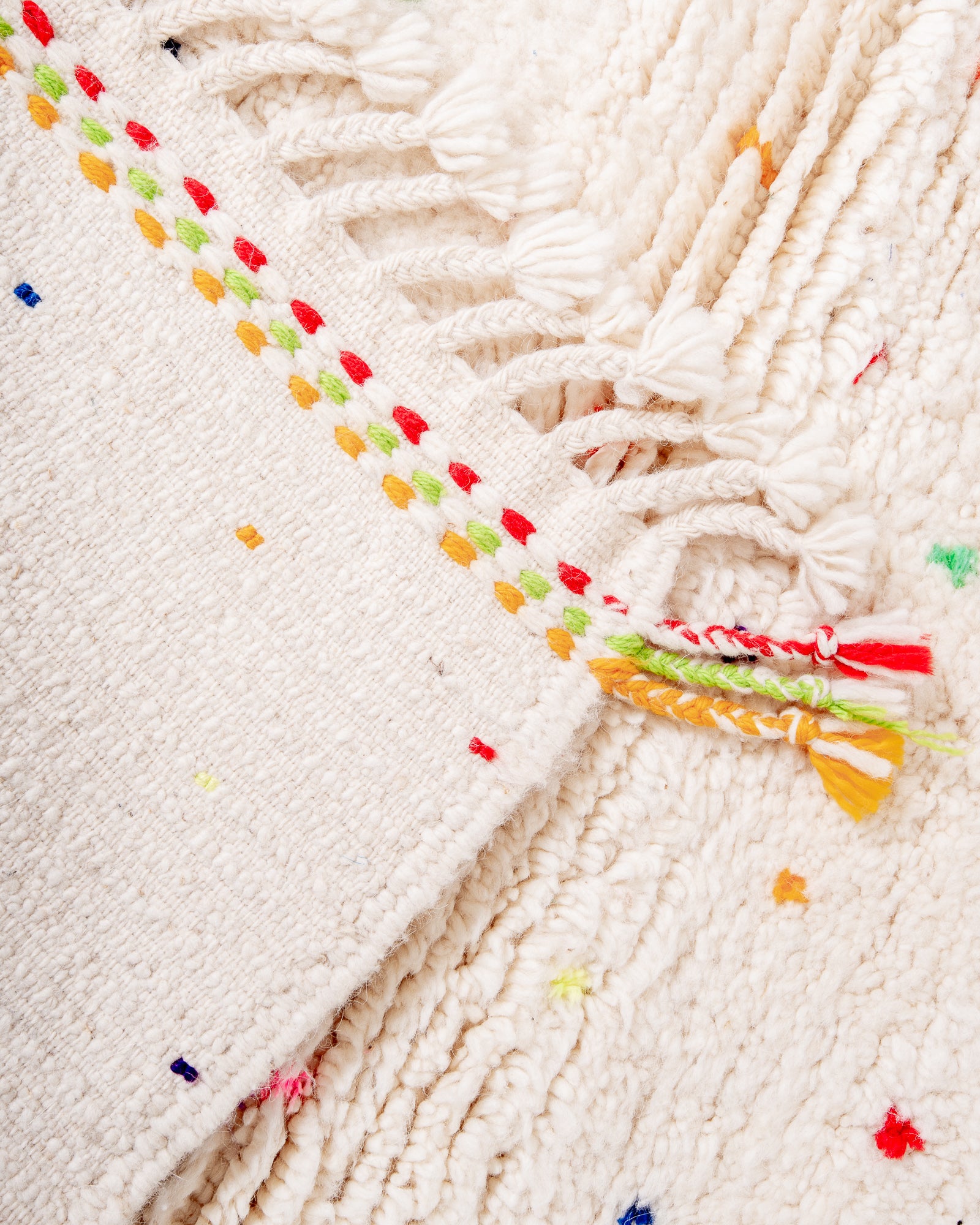 Modern, designer, handcrafted Berber rug from Morocco. Beniourain carpet with beautiful colours and patterns and fluffy wool texture.
